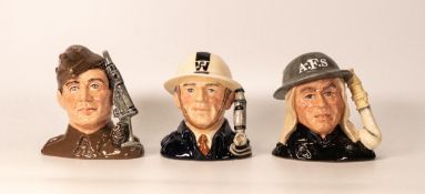 Royal Doulton set of small character jugs The A.R.P Warden D6872 , Auxiliary Fireman D6887 and