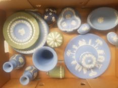 A mixed collection of Wedgwood jasperware items to include table lighter, lidded pots, vases &