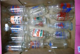 A collection of Collectable Milk Bottles