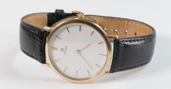 Gentlemans Titan wrist watch with leather strap, original box & paperwork.