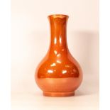 Moorcroft orange lustre vase. Height 22.5cm
