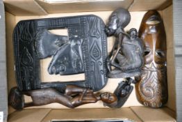A collection of carved African type figures & wall plaque
