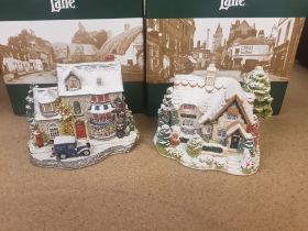 Two Lilliput Christmas themed cottages to include Christmas lights at the bell inn L2485 and