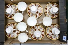 Royal Albert Lady Hamilton patterned cups & saucers, six larger cups without saucers