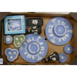 A collection of Wedgwood jasper ware to include bud vases, plates, pin dishes, boxed plaque etc (