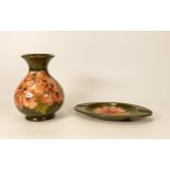 Moorcroft Hibiscus on green vase together with a matching ashtray. Height of vase 13cm (2)