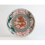 Chinese 19th century Famille Rose shallow bowl decorated with dragon and foliage. Period staple