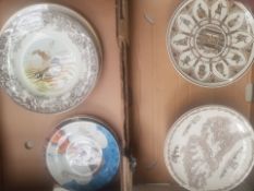 A mixed collection of decorative wall plates to include Wedgwood calendar plates etc (2 trays)