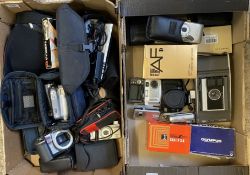 A mixed collection of camera equipment to include Polaroid J66 Land Camera, Canon Camera Bodies,