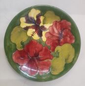 Moorcroft Hibiscus on Green Ground Charger diameter 26cm.