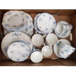 A collection of blue and white floral tea ware items to include Johnson Bros and gladstone china etc