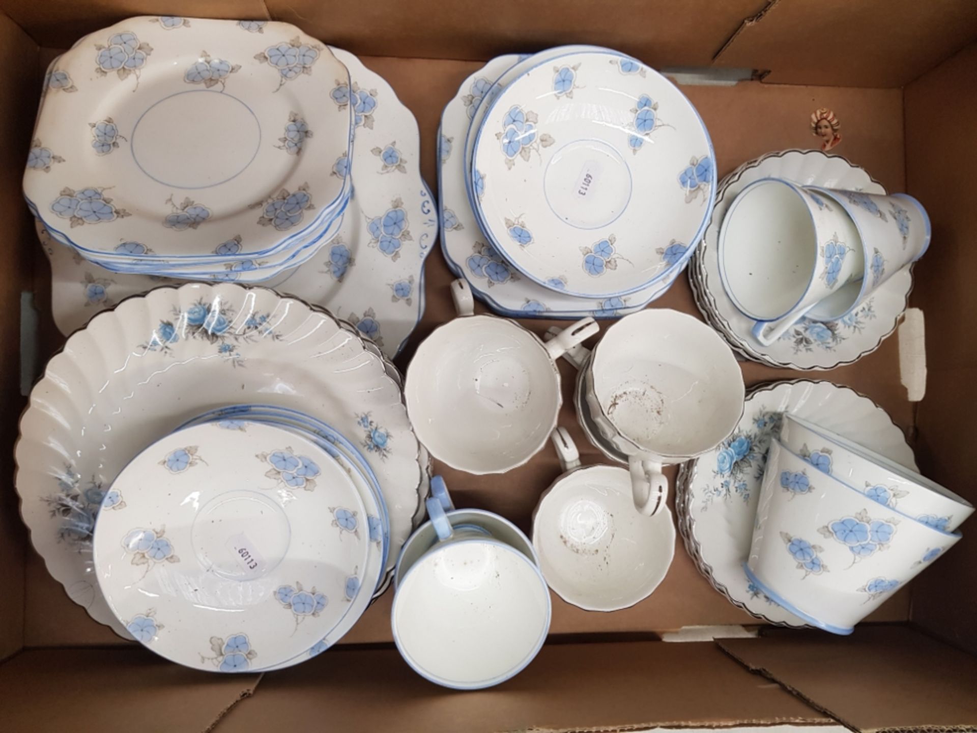 A collection of blue and white floral tea ware items to include Johnson Bros and gladstone china etc