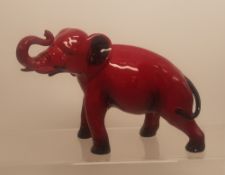 Royal Doulton Flambe model of Elephant with trunk in salute, h.13cm.