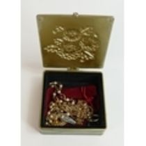 A Enamelled floral jewellery box containing some costume jewellery.