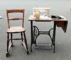 Singer Treadle Sewing Machine Base with later machine fitted together with antique chair modified to