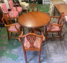 20th Century Mahogany extending pedestal dining table together with 4 matching dining carver