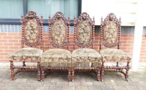A Set of Four 19th Century Upholstered Chairs with barley twist elements and carved fruit in high