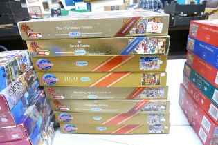 A collection of Gibsons Christmas Theme 1000 Piece Jigsaw Puzzles (vendor states complete but sold