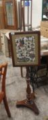 An Ealry 20th Century Fire Screen Pole with a 20th Century Embroidered scene depicting figures in
