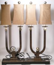 A pair of modern twin arms side lamps. Height 77cm
