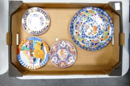 A collection of 20th Century Oriental theme wall plates
