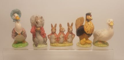 A collection of Beatrix Potter figures to include Beswick Timmy Tiptoes, Sally Henny Penny, Jemima