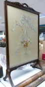 Edwardian Mahogany Hand Embroidered Fire Screen: height 106cm