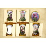 A collection of Boxed Bradford Exchange Decorative Floral Wall Plates (6)