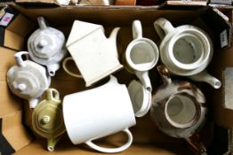 A collection of Wade Novelty teapots .These items were removed from the archives of the Wade factory