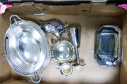 A collection of silver plated items including serving dish, golet, sauce boat etc