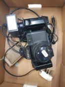 Vintage Tamashi Film camera with flash unit together with vintage remington shaver