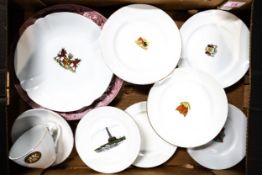 A collection of plates showing various crests from around the UK together with Wedgwood dinner plate