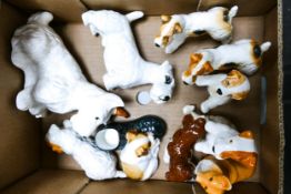 A collection of ten Beswick dogs to include Forestedge Foxglove, Corgi, Airedale Terriers, Begging