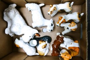 A collection of ten Beswick dogs to include Forestedge Foxglove, Corgi, Airedale Terriers, Begging
