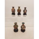 A group of 5 miniature Cloissone vases on hardwood stands height of tallest 54mm