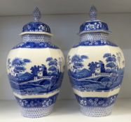 A pair of Spode Blue Tower pattern temple jars (height 40cm)(small chip to top rim of one of the ja