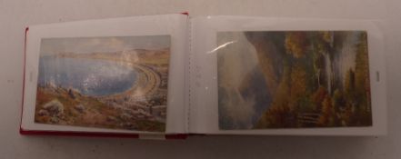 A collection of Warren Williams theme vintage postcards
