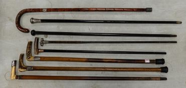 8 Vintage Walking Sticks some with white metal bands or horn handles