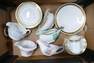 A collection of Shelley to include bread & butter plate, 11 side plates, 10 saucers, milk jug, gravy
