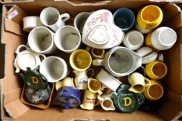 A collection of Wade advertising pots, tea bag plates etc .These items were removed from the