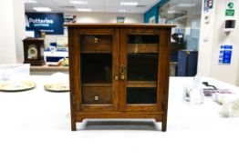 Early 20th Century Smoker Cabinet with glazed doors, height 39cm (with key)