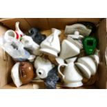 A collection of Wade Jugs , Money Box, Door Plaques etc .These items were removed from the