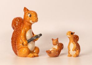 Three Beswick Comical Squirrels including 1009 etc , tallest 11.5cm(3)