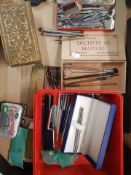 A mixed collection of writing items to include pens, makes include Parker, Paper Mate etc, cased
