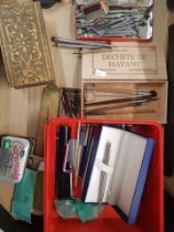 A mixed collection of writing items to include pens, makes include Parker, Paper Mate etc, cased