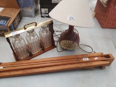 A mixed collection of items to include Oak and brass tantalus, stoneware lamp & easel