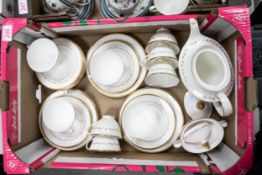 A collection of Royal Doulton Covington patterned tea ware including trio's teapot, milk & sugar etc