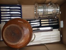A mixed collection of items to include cased cutlery sets, silver plated wine holder, Oak footed