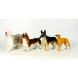 Four Beswick Dog figures to include Champion Ulrica of Brittas, Foot Marksman of Allways, Old
