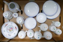 A collection of Shelley ware to include saucers, side plates, cups, milk jug, sugar bowl etc.
